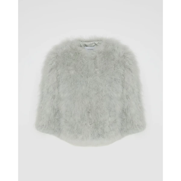 Woman wearing Yves Salomon shearling fur coat – luxury outerwear at Luxury Shoes 