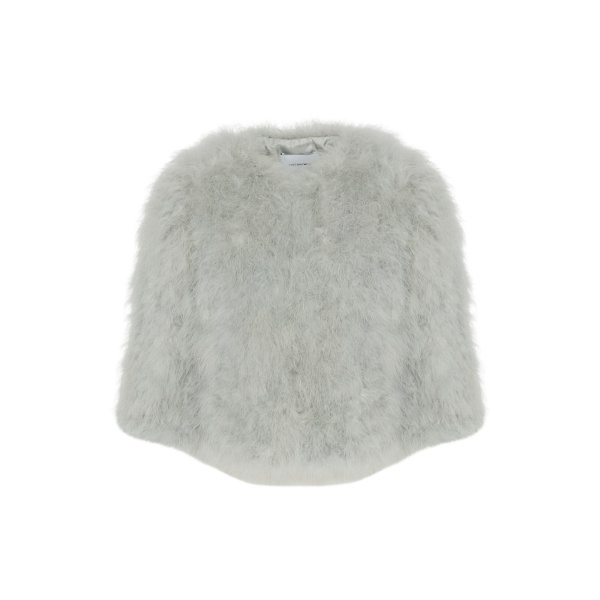 Woman wearing Yves Salomon shearling fur coat – luxury outerwear at Luxury Shoes 