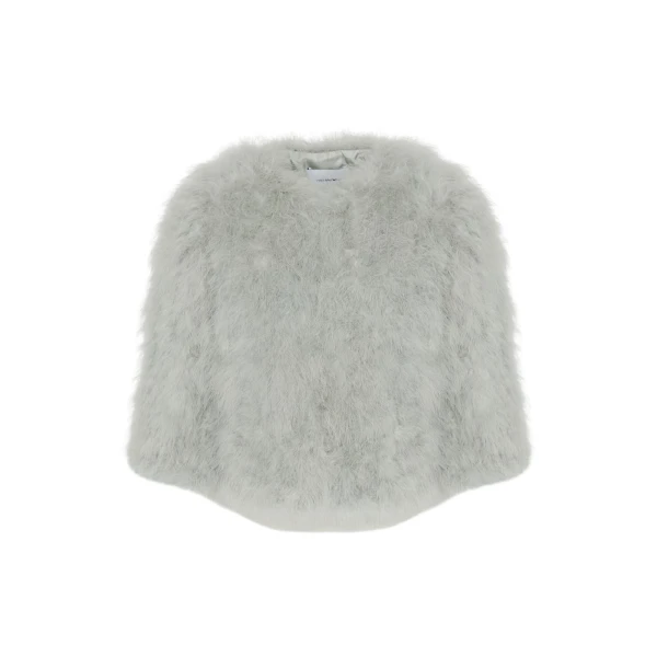 Woman wearing Yves Salomon shearling fur coat – luxury outerwear at Luxury Shoes 