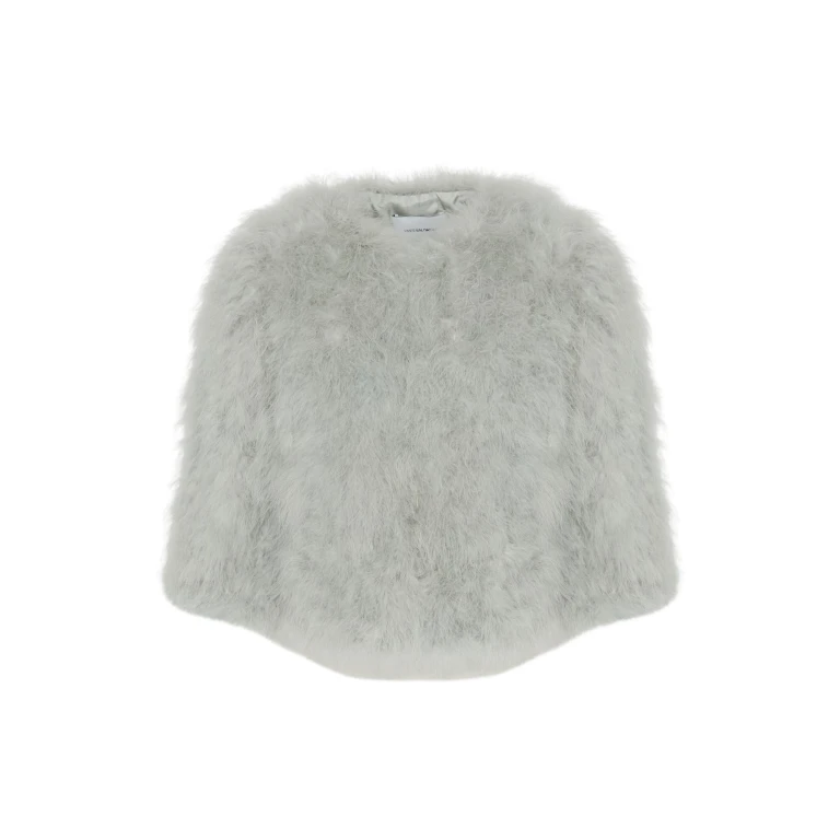 Woman wearing Yves Salomon shearling fur coat – luxury outerwear at Luxury Shoes 