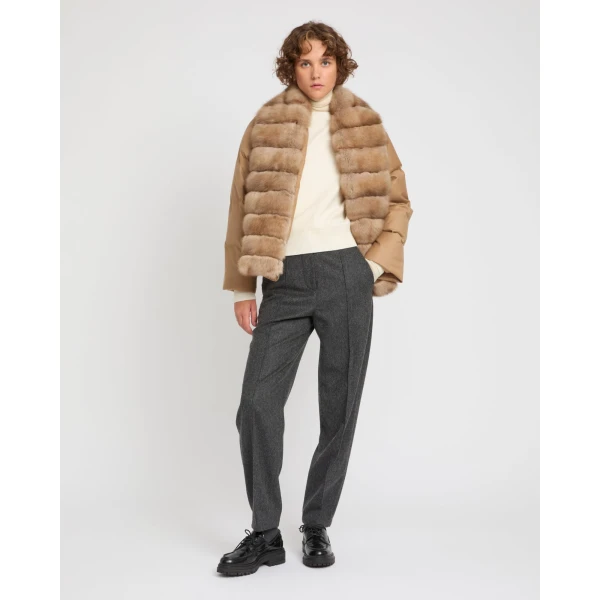 Woman wearing Yves Salomon shearling fur coat – luxury outerwear at Luxury Shoes 