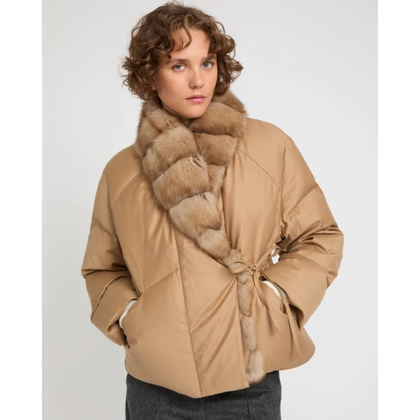 Woman wearing Yves Salomon shearling fur coat – luxury outerwear at Luxury Shoes 