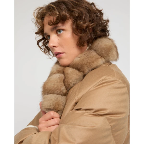 Woman wearing Yves Salomon shearling fur coat – luxury outerwear at Luxury Shoes 