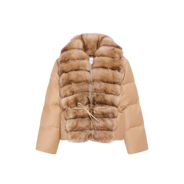 Woman wearing Yves Salomon shearling fur coat – luxury outerwear at Luxury Shoes 