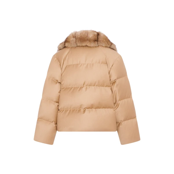 Woman wearing Yves Salomon shearling fur coat – luxury outerwear at Luxury Shoes 