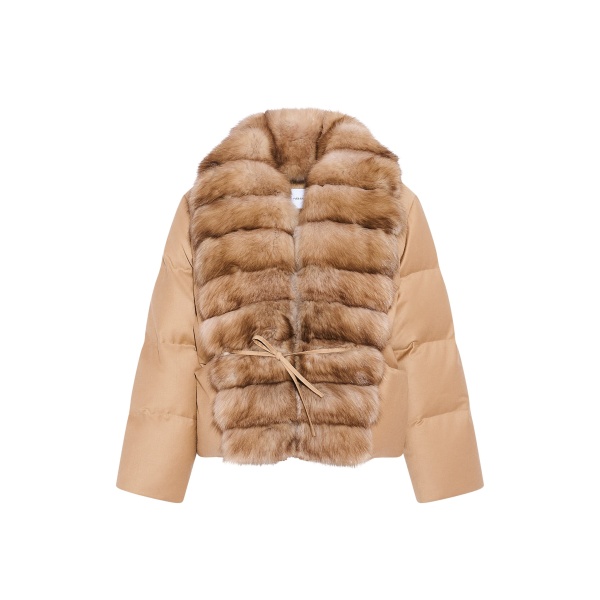 Woman wearing Yves Salomon shearling fur coat – luxury outerwear at Luxury Shoes 