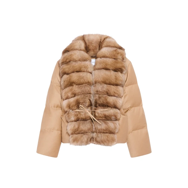 Woman wearing Yves Salomon shearling fur coat – luxury outerwear at Luxury Shoes 