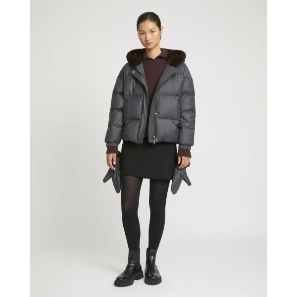 Woman wearing Yves Salomon shearling fur coat – luxury outerwear at Luxury Shoes 
