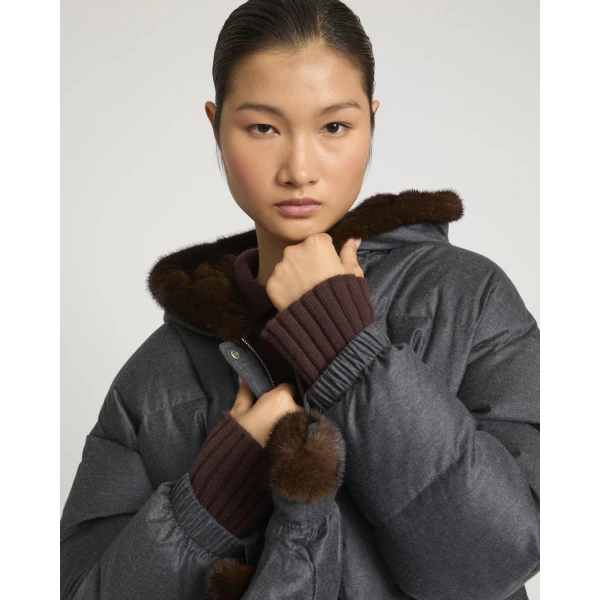 Woman wearing Yves Salomon shearling fur coat – luxury outerwear at Luxury Shoes 