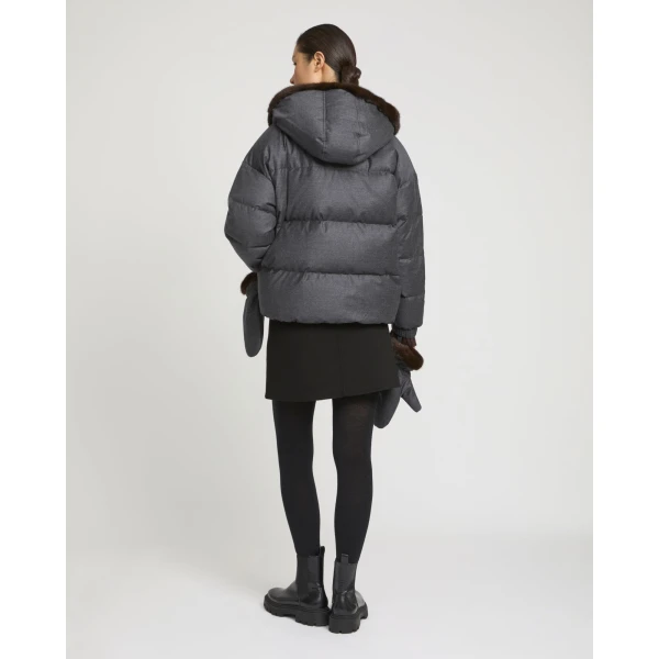 Woman wearing Yves Salomon shearling fur coat – luxury outerwear at Luxury Shoes 