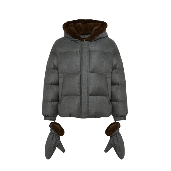 Woman wearing Yves Salomon shearling fur coat – luxury outerwear at Luxury Shoes 