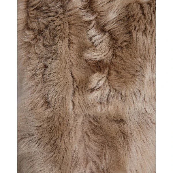 Woman wearing Yves Salomon shearling fur coat – luxury outerwear at Luxury Shoes 