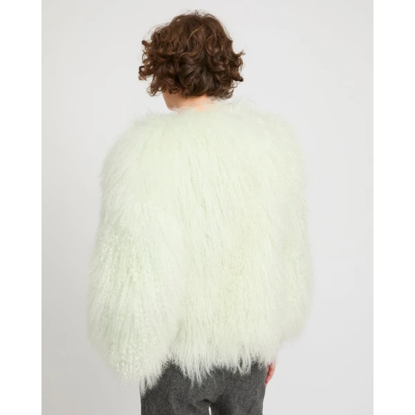 Woman wearing Yves Salomon shearling fur coat – luxury outerwear at Luxury Shoes 