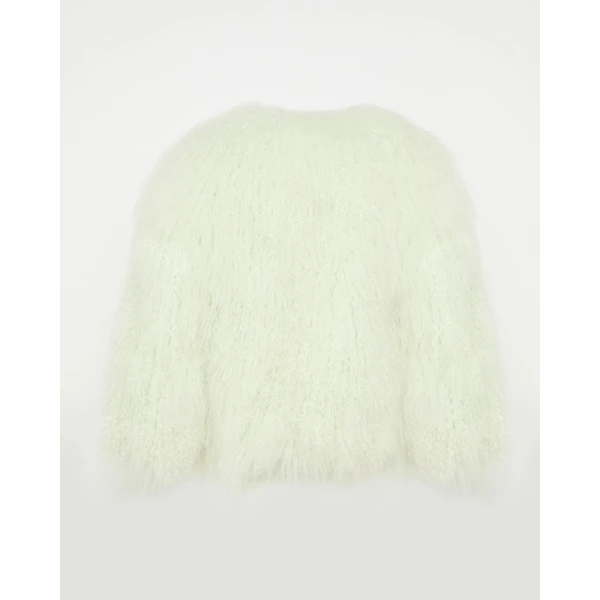 Woman wearing Yves Salomon shearling fur coat – luxury outerwear at Luxury Shoes 