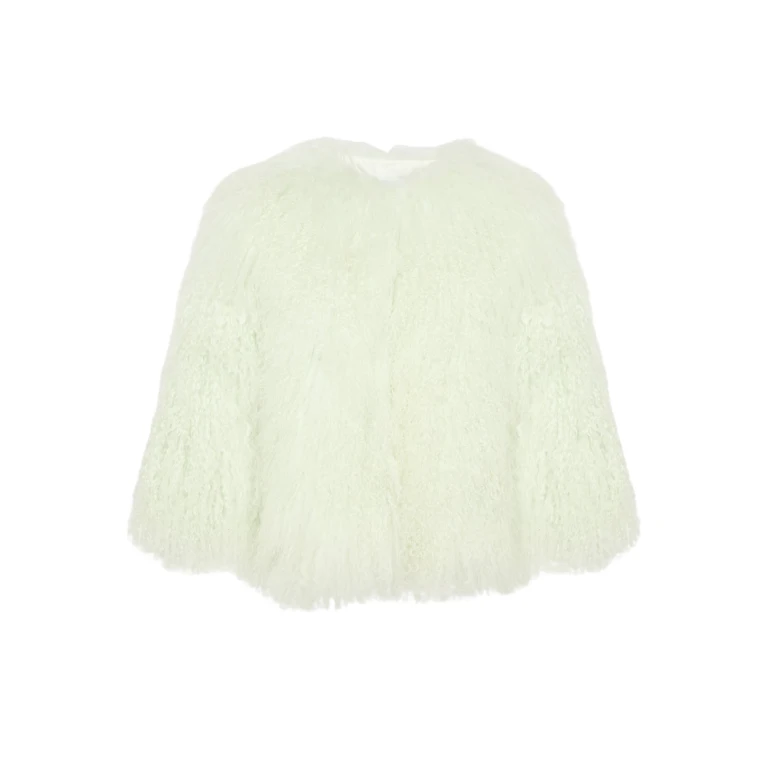 Woman wearing Yves Salomon shearling fur coat – luxury outerwear at Luxury Shoes 