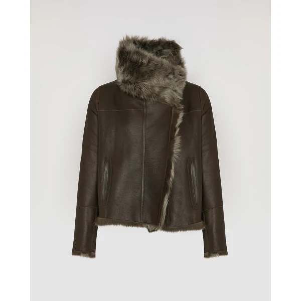 Woman wearing Yves Salomon shearling fur coat – luxury outerwear at Luxury Shoes 