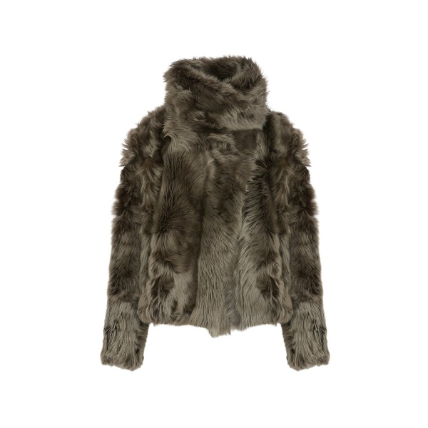Woman wearing Yves Salomon shearling fur coat – luxury outerwear at Luxury Shoes 