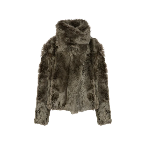 Woman wearing Yves Salomon shearling fur coat – luxury outerwear at Luxury Shoes 