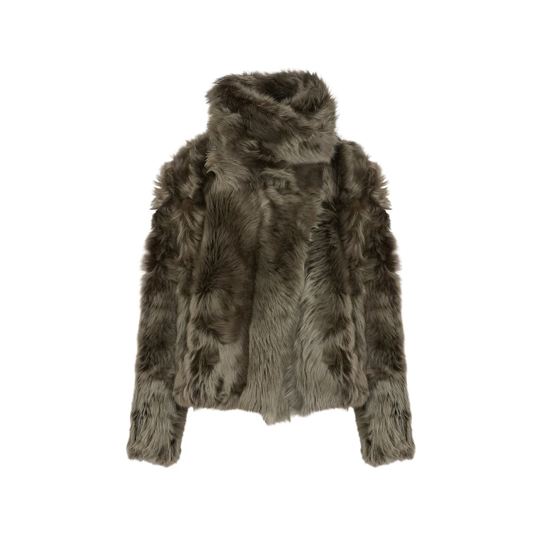 Woman wearing Yves Salomon shearling fur coat – luxury outerwear at Luxury Shoes 