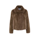 Woman wearing Yves Salomon shearling fur coat – luxury outerwear at Luxury Shoes 