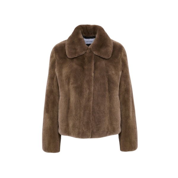 Woman wearing Yves Salomon shearling fur coat – luxury outerwear at Luxury Shoes 