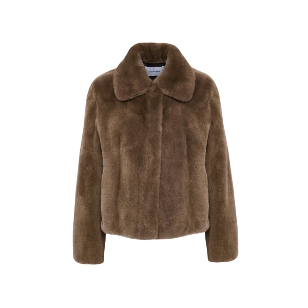 Woman wearing Yves Salomon shearling fur coat – luxury outerwear at Luxury Shoes 