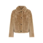 Woman wearing Yves Salomon shearling fur coat – luxury outerwear at Luxury Shoes 