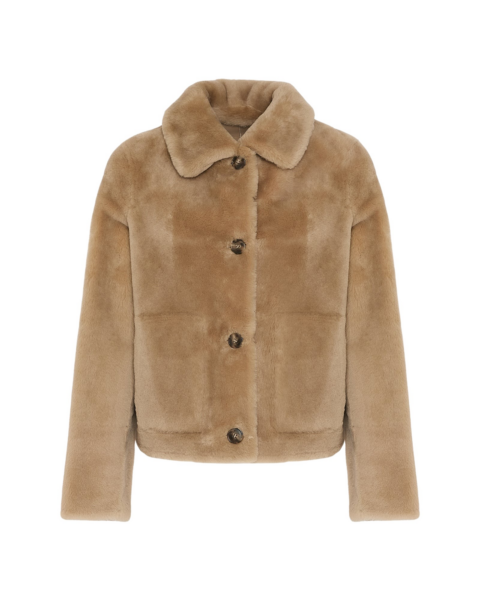 Woman wearing Yves Salomon shearling fur coat – luxury outerwear at Luxury Shoes 