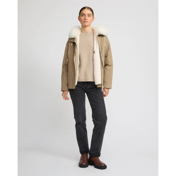 Woman wearing Yves Salomon shearling fur coat – luxury outerwear at Luxury Shoes 