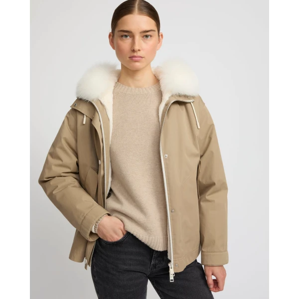 Woman wearing Yves Salomon shearling fur coat – luxury outerwear at Luxury Shoes 