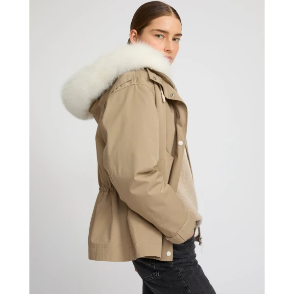Woman wearing Yves Salomon shearling fur coat – luxury outerwear at Luxury Shoes 