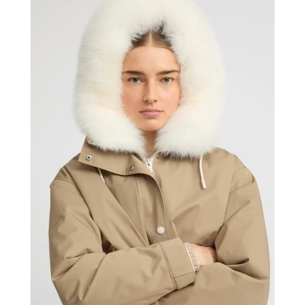 Woman wearing Yves Salomon shearling fur coat – luxury outerwear at Luxury Shoes 