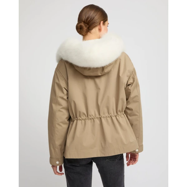 Woman wearing Yves Salomon shearling fur coat – luxury outerwear at Luxury Shoes 