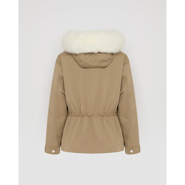 Woman wearing Yves Salomon shearling fur coat – luxury outerwear at Luxury Shoes 