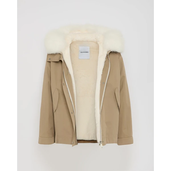 Woman wearing Yves Salomon shearling fur coat – luxury outerwear at Luxury Shoes 
