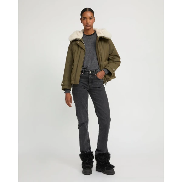 Woman wearing Yves Salomon shearling fur coat – luxury outerwear at Luxury Shoes 