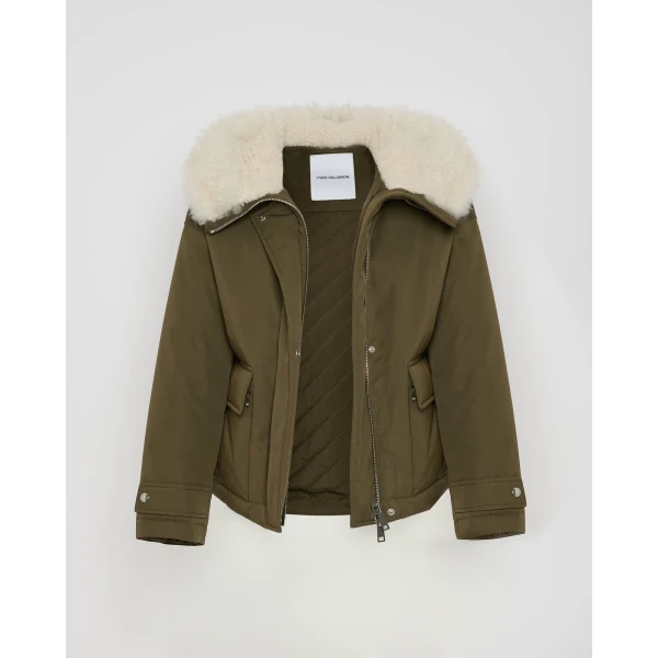 Woman wearing Yves Salomon shearling fur coat – luxury outerwear at Luxury Shoes 