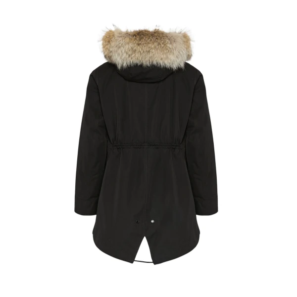 Woman wearing Yves Salomon shearling fur coat – luxury outerwear at Luxury Shoes 