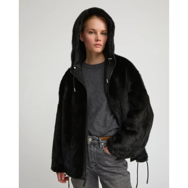 Woman wearing Yves Salomon shearling fur coat – luxury outerwear at Luxury Shoes 