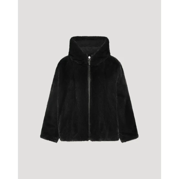 Woman wearing Yves Salomon shearling fur coat – luxury outerwear at Luxury Shoes 