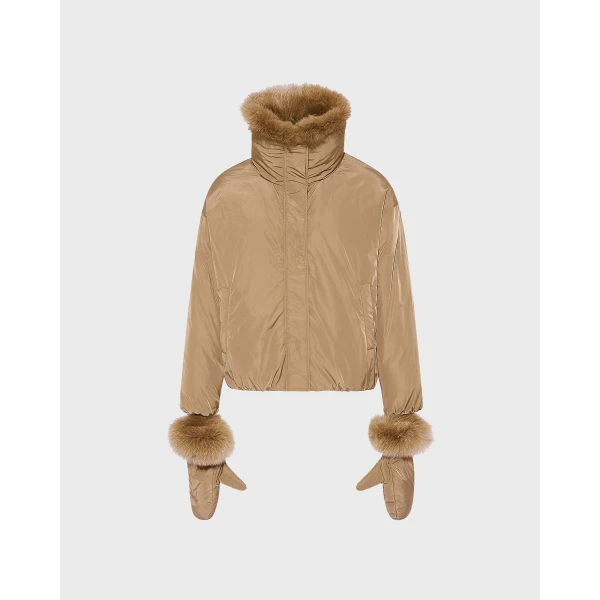 Woman wearing Yves Salomon shearling fur coat – luxury outerwear at Luxury Shoes 