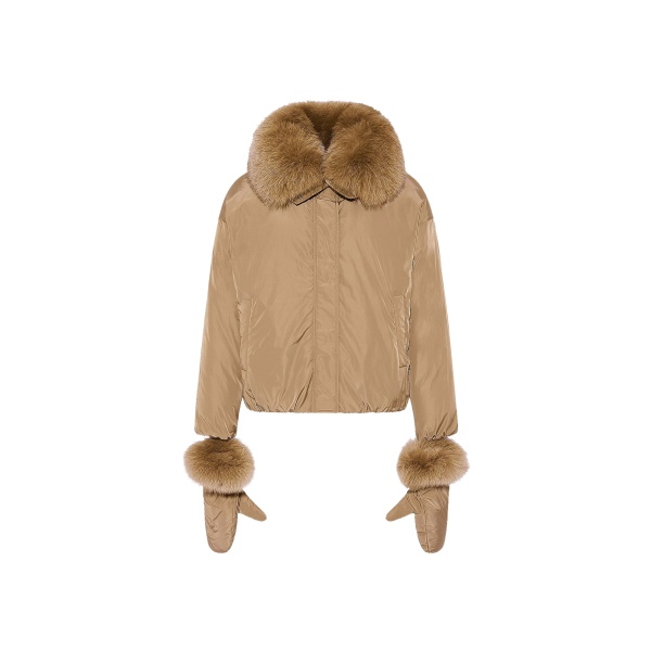 Woman wearing Yves Salomon shearling fur coat – luxury outerwear at Luxury Shoes 