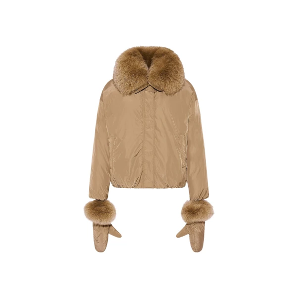 Woman wearing Yves Salomon shearling fur coat – luxury outerwear at Luxury Shoes 