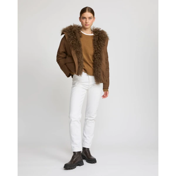 Woman wearing Yves Salomon shearling fur coat – luxury outerwear at Luxury Shoes 
