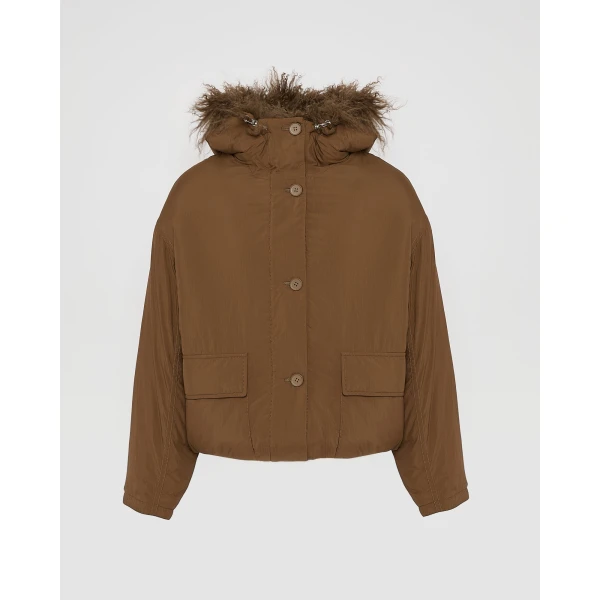Woman wearing Yves Salomon shearling fur coat – luxury outerwear at Luxury Shoes 