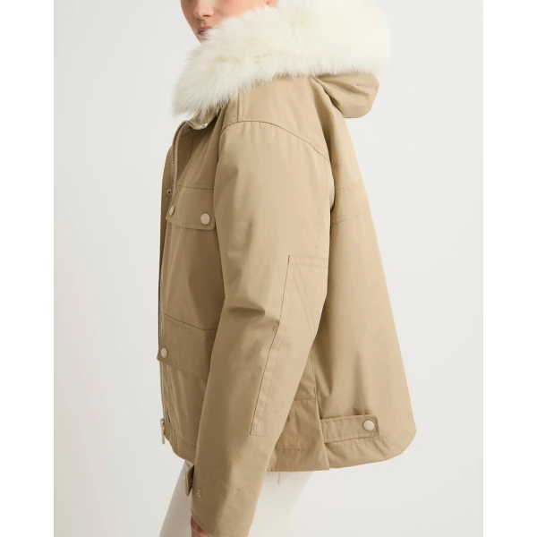 Woman wearing Yves Salomon shearling fur coat – luxury outerwear at Luxury Shoes 