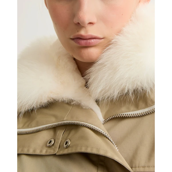 Woman wearing Yves Salomon shearling fur coat – luxury outerwear at Luxury Shoes 