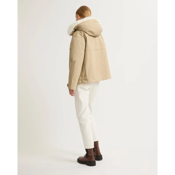 Woman wearing Yves Salomon shearling fur coat – luxury outerwear at Luxury Shoes 