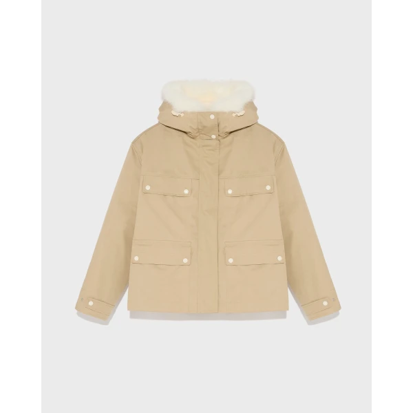 Woman wearing Yves Salomon shearling fur coat – luxury outerwear at Luxury Shoes 