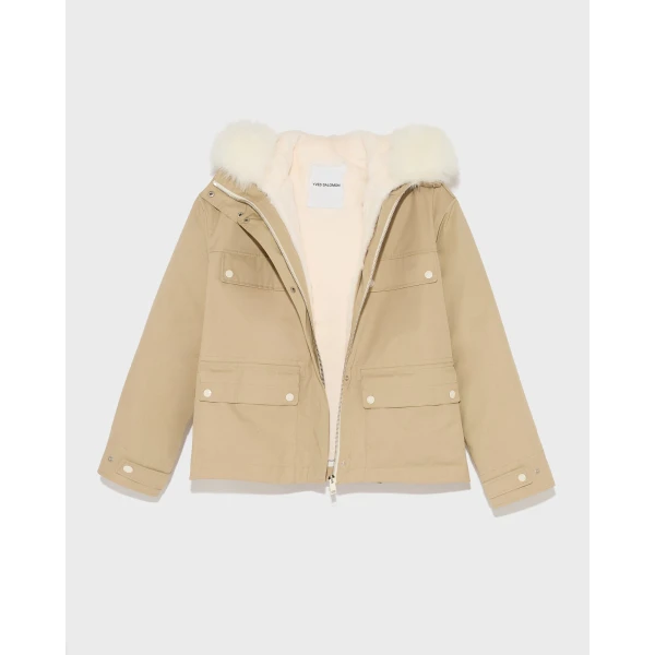 Woman wearing Yves Salomon shearling fur coat – luxury outerwear at Luxury Shoes 